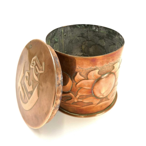 8 - A Newlyn copper cylindrical tea caddy and cover. Repousse decorated with a band of medlars on a punc... 