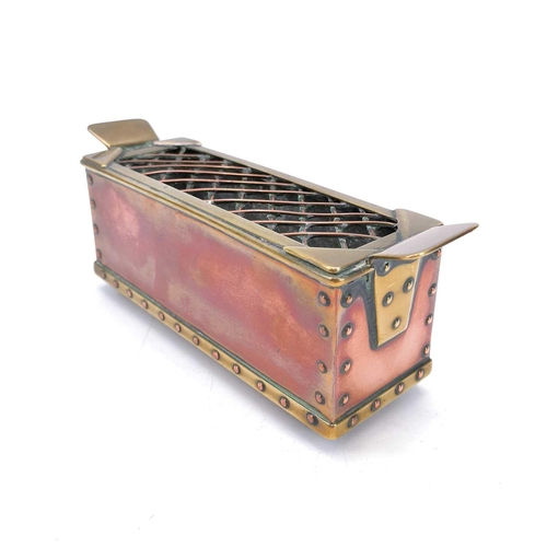 80 - An Arts and Crafts copper and brass bound flower basket with an inscribed base by N R Hartley. This ... 