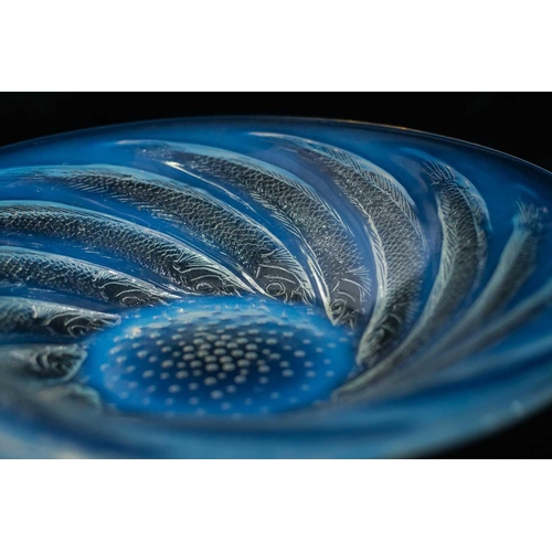 803 - A Lalique opalescent glass bowl, Poisson. The border moulded with fish, marked internally to the cen... 