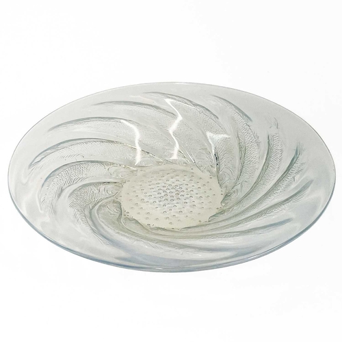 803 - A Lalique opalescent glass bowl, Poisson. The border moulded with fish, marked internally to the cen... 