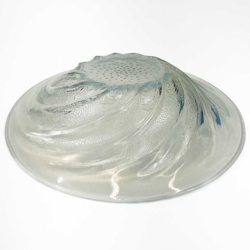 803 - A Lalique opalescent glass bowl, Poisson. The border moulded with fish, marked internally to the cen... 