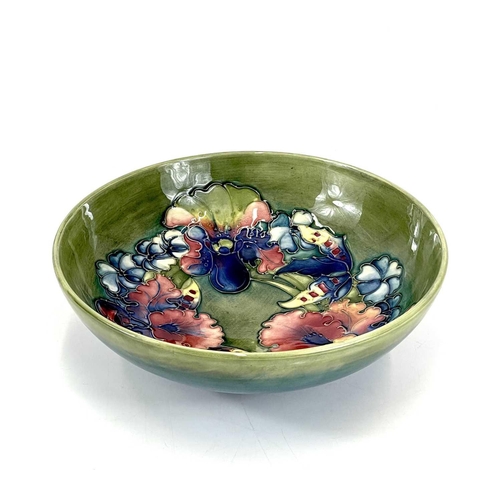 804 - A Moorcroft pottery bowl decorated in the Iris and Spring Flowers pattern. Height 7cm diameter 22cm.