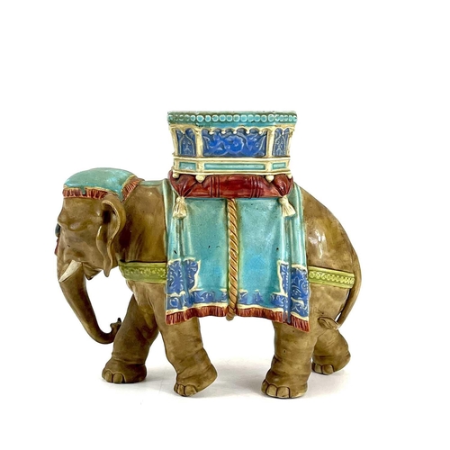 805 - A Royal Worcester porcelain vase designed by James Hadley. Modelled as an elephant with howdah. Impr... 