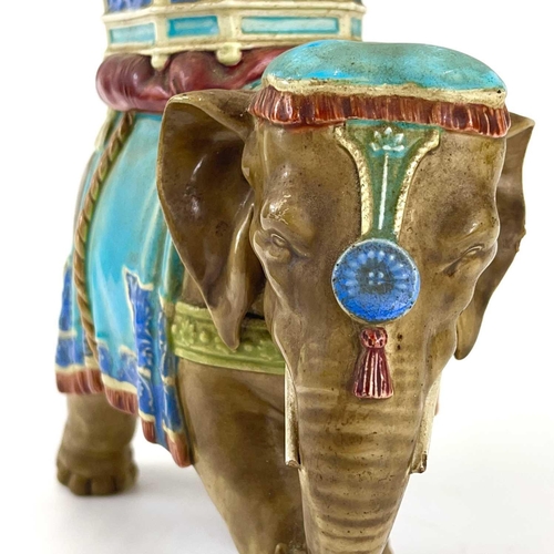 805 - A Royal Worcester porcelain vase designed by James Hadley. Modelled as an elephant with howdah. Impr... 