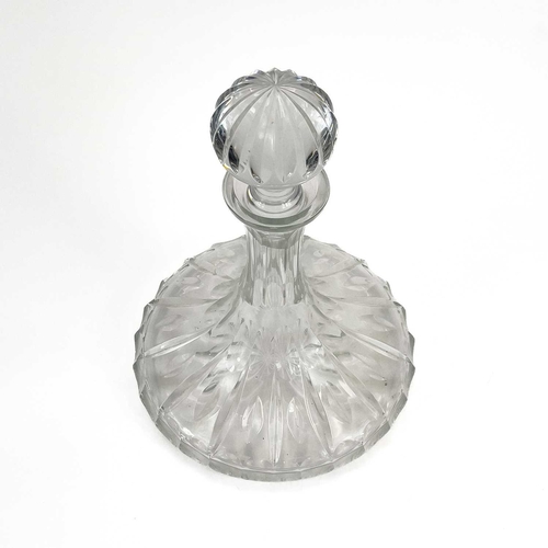 807 - A cut glass ship's decanter and stopper. Height 26cm, together with a Victorian cranberry glass smal... 