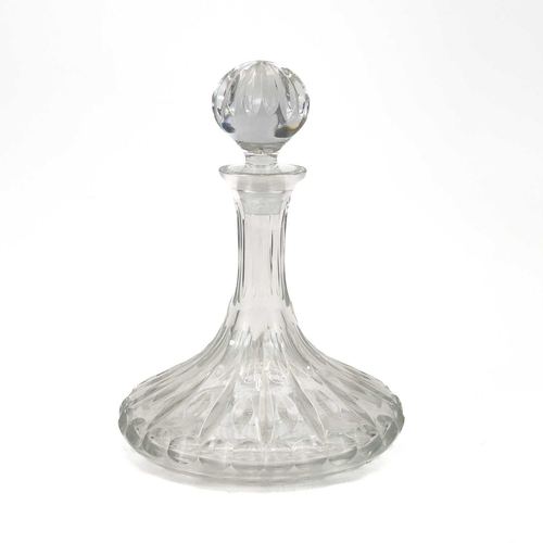 807 - A cut glass ship's decanter and stopper. Height 26cm, together with a Victorian cranberry glass smal... 