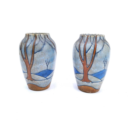 818 - A pair of Burleigh ware Art Deco vases. With tube-lined and painted decoration by Harold Bennett, he... 