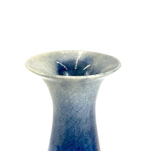 820 - Chris PRINDL A studio pottery bottle vase in a flambe glaze, signed to base, height 25.5cm.