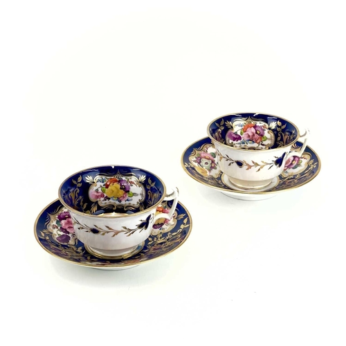 826 - A Pair of English porcelain tea cups and saucers, probably Coalport. Circa 1820, painted with floral... 