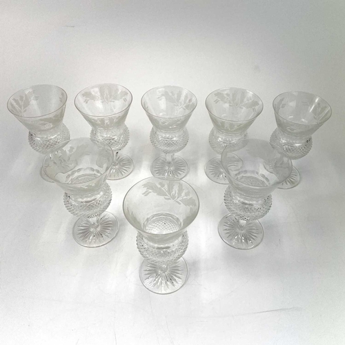 828 - A set of eight Edinburgh Crystal thistle glasses. Height 13cm.