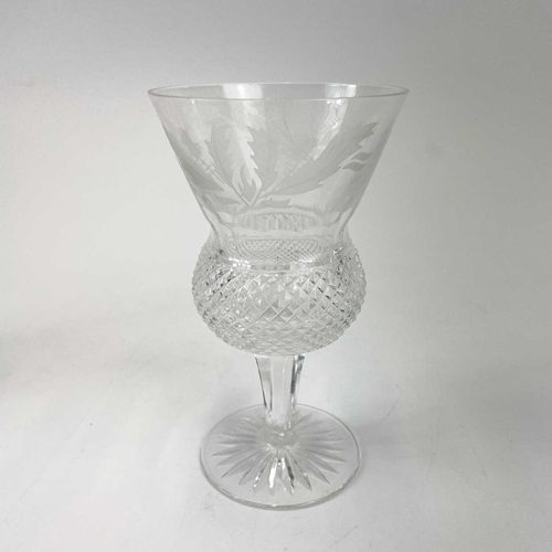 828 - A set of eight Edinburgh Crystal thistle glasses. Height 13cm.