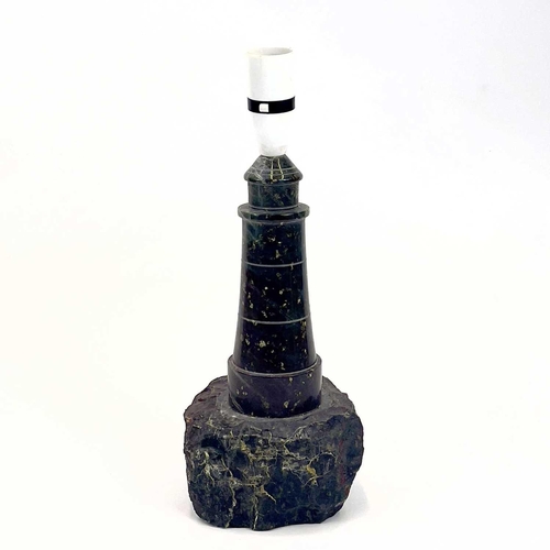 83 - Cornish Serpentine: A turned and polished table lamp in the form of a lighthouse. Height 34cm overal... 