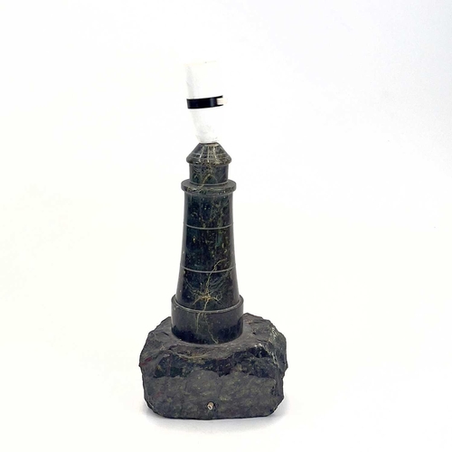 83 - Cornish Serpentine: A turned and polished table lamp in the form of a lighthouse. Height 34cm overal... 