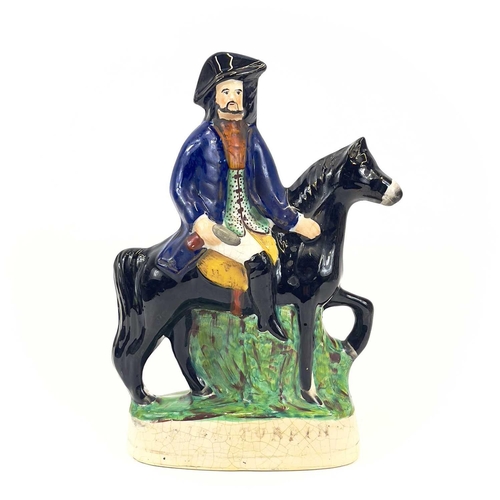 838 - A pair of Staffordshire figures of Dick Turpin and Tom King. Probably 1920s, height 31cm, together w... 