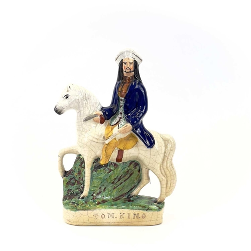 838 - A pair of Staffordshire figures of Dick Turpin and Tom King. Probably 1920s, height 31cm, together w... 