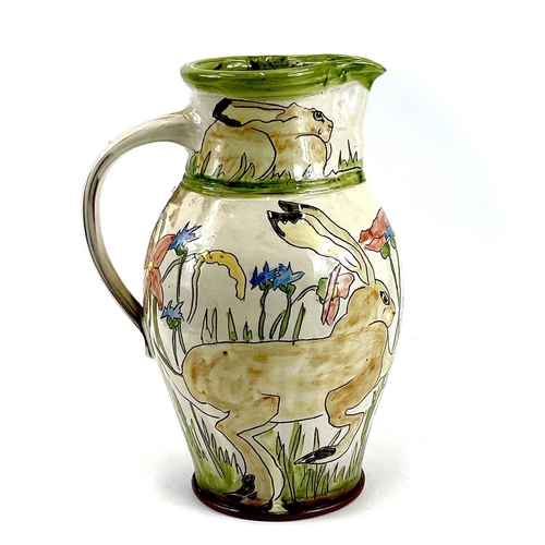 839 - Two Jennie HALE earthenware jugs. One decorated with hares amongst wildflowers, the other with deer ... 