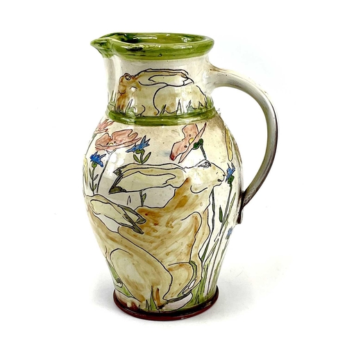 839 - Two Jennie HALE earthenware jugs. One decorated with hares amongst wildflowers, the other with deer ... 