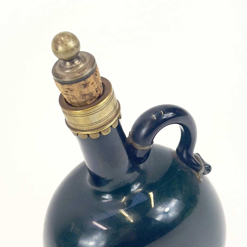 845 - A Victorian silver-mounted brown glass flask. Height 20.5cm. Together with two other similar flasks ... 