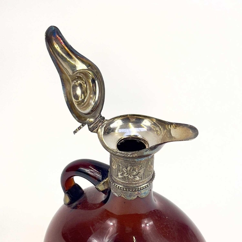 845 - A Victorian silver-mounted brown glass flask. Height 20.5cm. Together with two other similar flasks ... 