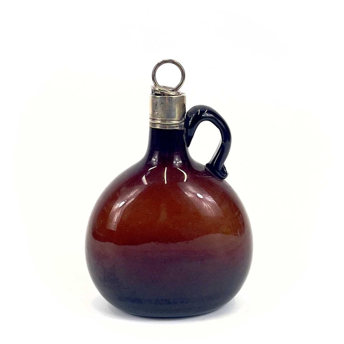 845 - A Victorian silver-mounted brown glass flask. Height 20.5cm. Together with two other similar flasks ... 