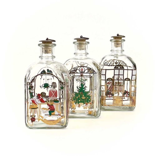 846 - Three Holmegaard glass decanters with metal stoppers. Decorated with Christmas scenes. Two bearing o... 