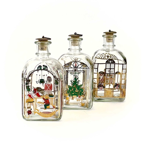 846 - Three Holmegaard glass decanters with metal stoppers. Decorated with Christmas scenes. Two bearing o... 