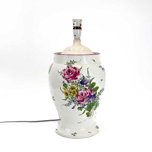 847 - A French Luneville pottery vase converted to a table lamp. With floral painted decoration, height 38... 