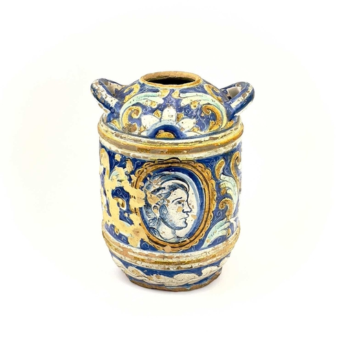 852 - A Maiolica portrait jar. 17th/18th century, with twin handles and a portrait medallion with flowers ... 