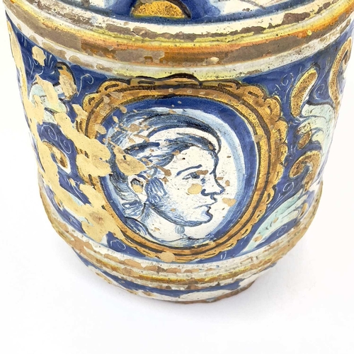 852 - A Maiolica portrait jar. 17th/18th century, with twin handles and a portrait medallion with flowers ... 