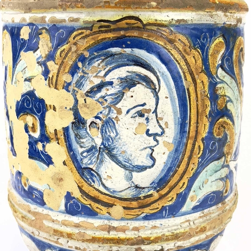 852 - A Maiolica portrait jar. 17th/18th century, with twin handles and a portrait medallion with flowers ... 