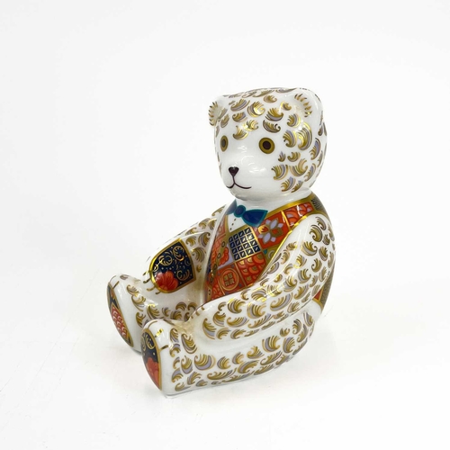 855 - A Royal Crown Derby porcelain teddy bear paperweight decorated in Imari and gilt highlights. With go... 