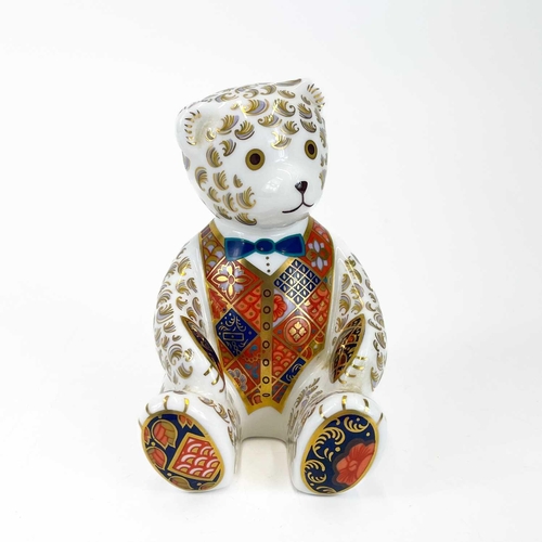 855 - A Royal Crown Derby porcelain teddy bear paperweight decorated in Imari and gilt highlights. With go... 