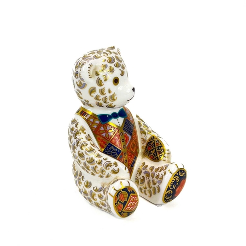 855 - A Royal Crown Derby porcelain teddy bear paperweight decorated in Imari and gilt highlights. With go... 