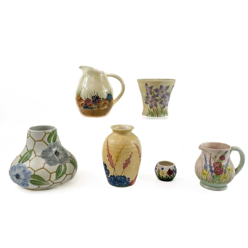 859 - A collection of Burslem E Radford pottery. Including vases, wall pockets and jugs. (box)