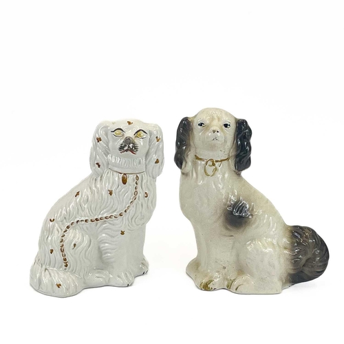 866 - A collection of six assorted Victorian Staffordshire spaniel ornaments. Height 28cm diminishing, tog... 