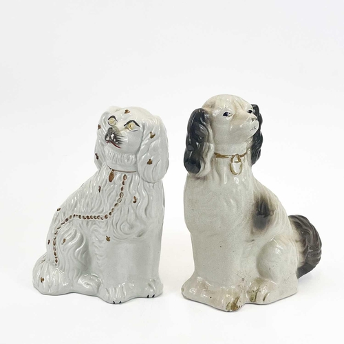 866 - A collection of six assorted Victorian Staffordshire spaniel ornaments. Height 28cm diminishing, tog... 