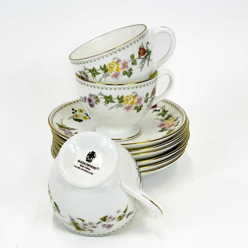 868 - Wedgwood 'Mirabelle' dinner, tea and coffee ware. Six place settings, comprising six dinner plates, ... 