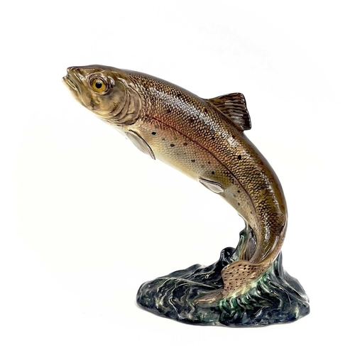 871 - A Beswick pottery trout. Height 17cm, together with a Lipplesdorf porcelain figure of a falconer. (2... 