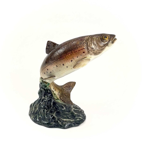 871 - A Beswick pottery trout. Height 17cm, together with a Lipplesdorf porcelain figure of a falconer. (2... 