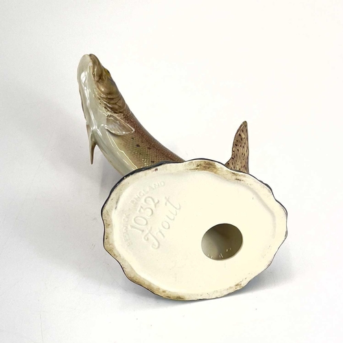 871 - A Beswick pottery trout. Height 17cm, together with a Lipplesdorf porcelain figure of a falconer. (2... 