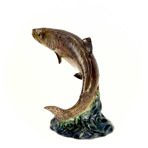 871 - A Beswick pottery trout. Height 17cm, together with a Lipplesdorf porcelain figure of a falconer. (2... 