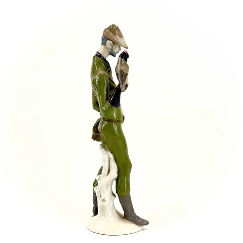 871 - A Beswick pottery trout. Height 17cm, together with a Lipplesdorf porcelain figure of a falconer. (2... 