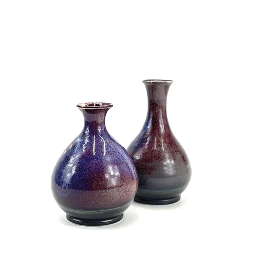 875 - Chris PRINDL A studio pottery bottle vase in a flambe glaze, height 19cm, together with a smaller sq... 