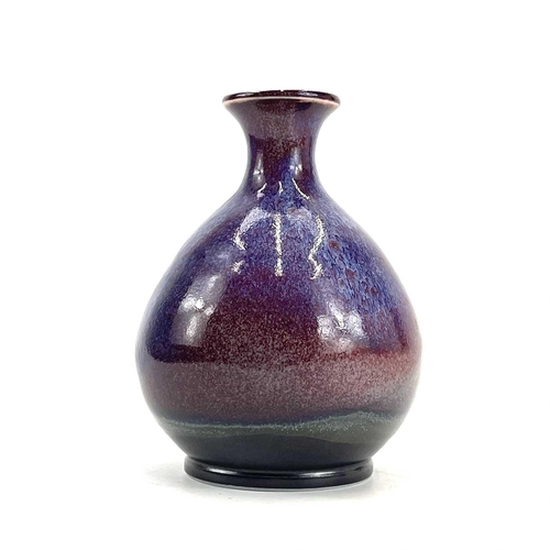 875 - Chris PRINDL A studio pottery bottle vase in a flambe glaze, height 19cm, together with a smaller sq... 