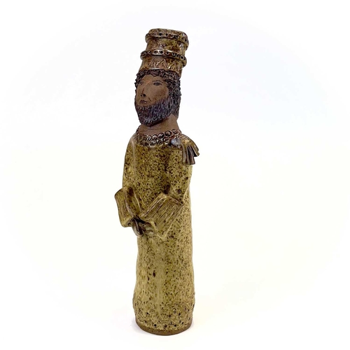 876 - A studio pottery figure of a King. Indistinctly inscribed Cornish? height 33cm.