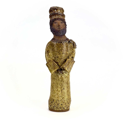 876 - A studio pottery figure of a King. Indistinctly inscribed Cornish? height 33cm.