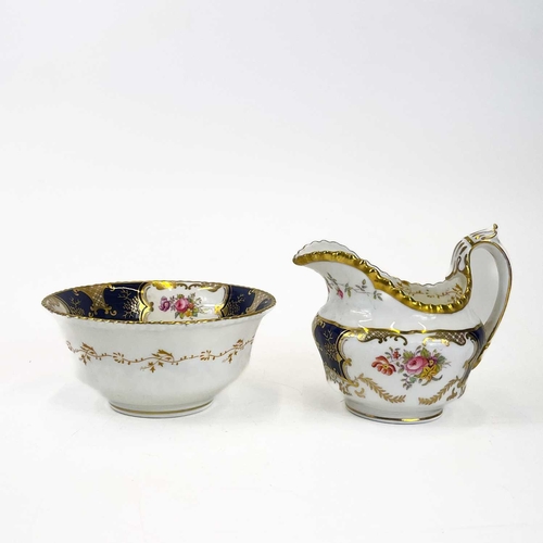 879 - A Coalport porcelain batwing part tea service. Comprising: two square cake plates, milk jug, sugar b... 