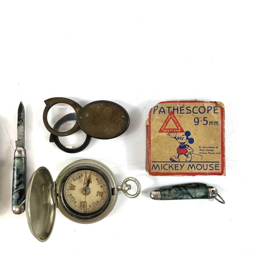 88 - A Stanley nickel folding compass, cased. Together with a cased pocket compass, a Mickey Mouse 9.5mm ... 