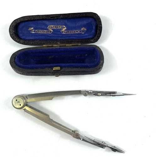 88 - A Stanley nickel folding compass, cased. Together with a cased pocket compass, a Mickey Mouse 9.5mm ... 