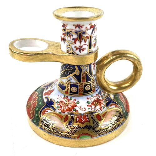 885 - A Spode porcelain chamberstick decorated with pattern 967 and highly gilt. Height 6cm together with ... 